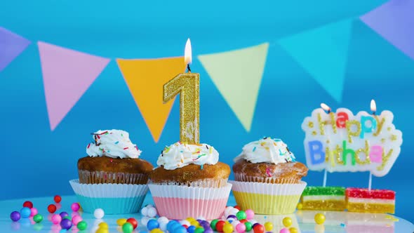 Beautiful Birthday Greetings To A Child Of 1 Years Old On A Blue Background. Festive Cake