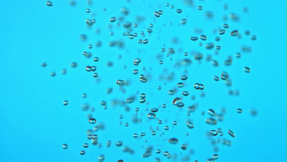 Super Slow Motion Air Bubbles Rise Up Under Water