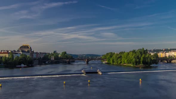 Vltava River Timelapse Hyperlapse in District Strelecky Ostrov with the Bridge of the Legions and