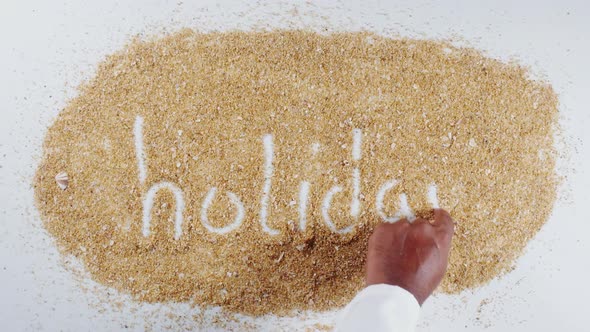 Sand Hand Writing Holiday