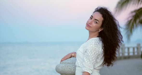 Wonderful Caucasian Woman Looking at the Camera. Young Beautiful Girl Enjoying Nature