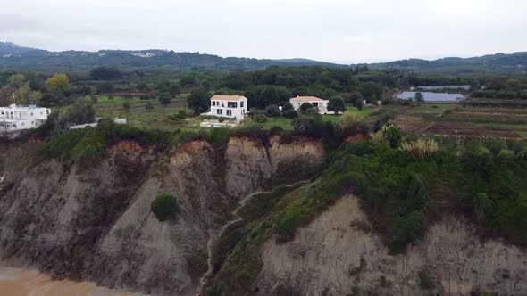 Amazing aerial drone flight fly forwards drone shot wedding location villa on cliff with pool.Parad