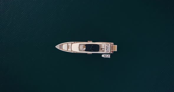 Aerial Directly Above Luxury Yacht Boat in Blue Mediterranean Sea