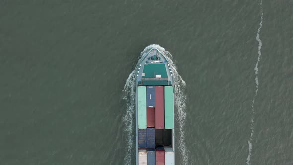 Bird's Eye View of a Cargo Shipping Container Ship at Sea