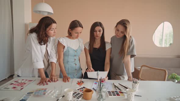 Front View of Four Beautiful Caucasian Female at Art Workshop