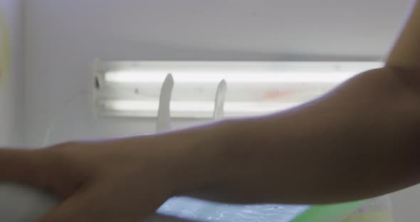 Male surfboard maker in his workshop