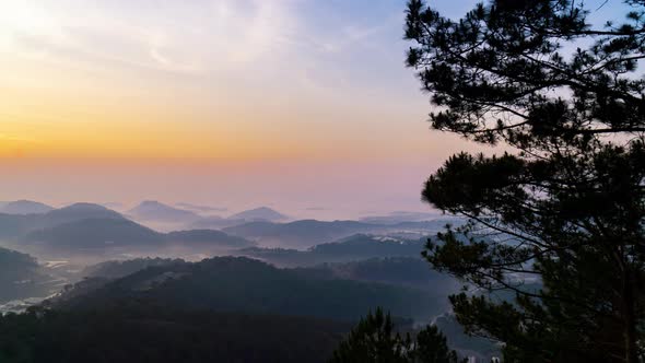 4K Timelapse Of Sunrise and Fog Blowing Over Mountain, Viet Nam