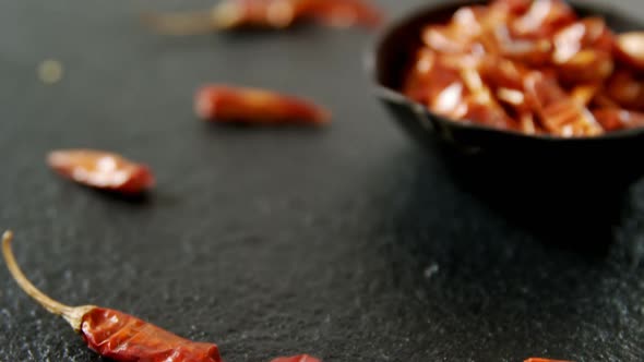 Dried chili pepper in bowl 4k