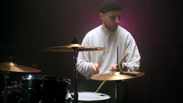 A Young Blogger Teaches the Game on the Drum Set