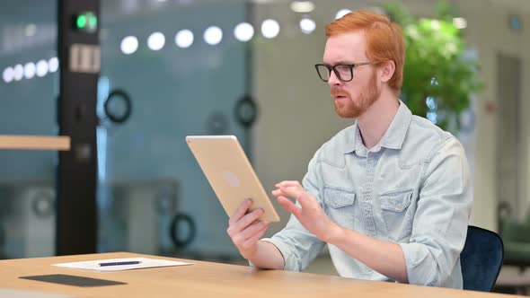 Disappointed Casual Redhead Man Reacting To Loss on Tablet 