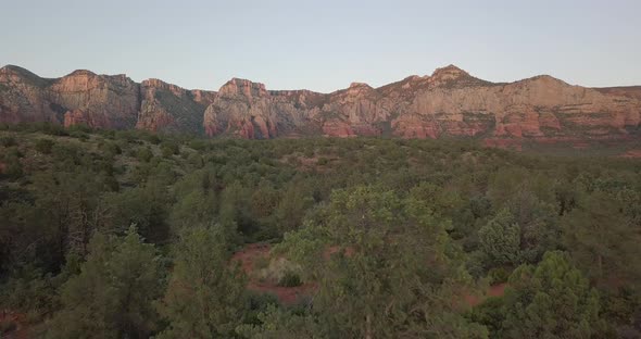 Drone shot of beautiful Sedona landscapes during a clear and bright morning