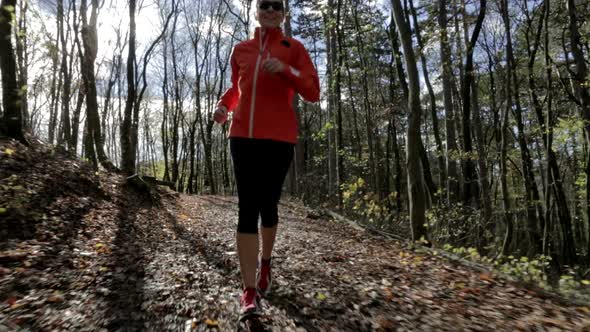 Woman Jogging in Wood