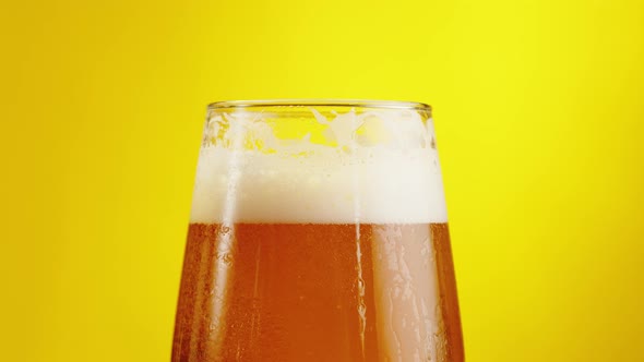 Foamy Beer in Glass Closeup