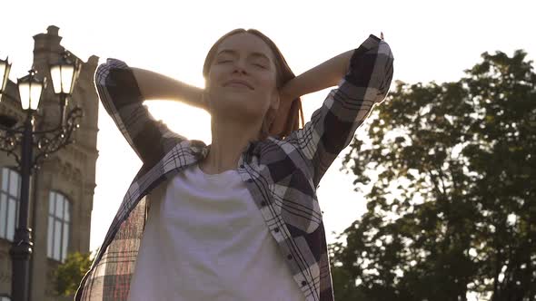 Happy and Positive Young Woman Showing Joyful Emotions