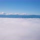 Flying above clouds in high mountains - VideoHive Item for Sale