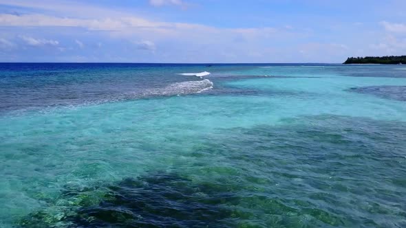 Sunny scenery of tourist beach by lagoon and sand background near sandbar