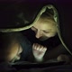 Little girl and her mother using tablet under the blanket. Close-up. - VideoHive Item for Sale