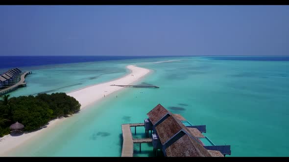 Aerial top view travel of tropical resort beach vacation by blue ocean with white sand background of