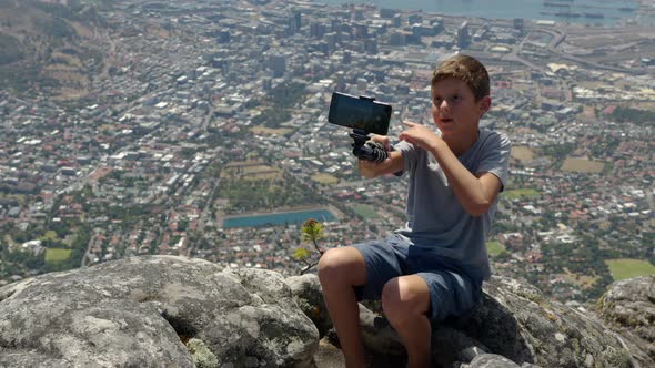 Young Travel Blogger Boy