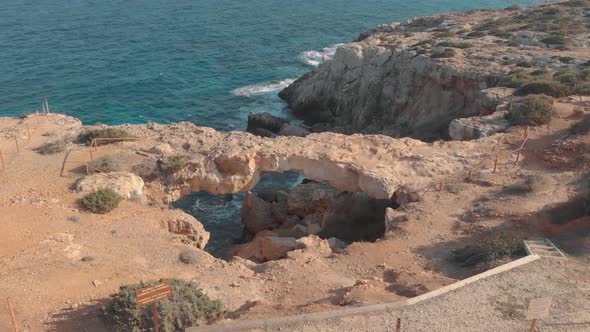 Aerial Drone View 4K Footage of Kamara Tou Koraka Stone Archt at Ayia Nappa, Cyprus