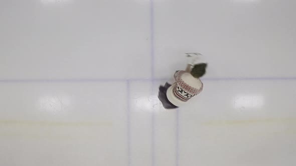 Ice Skater Spinning Into Shot On Ice Rink