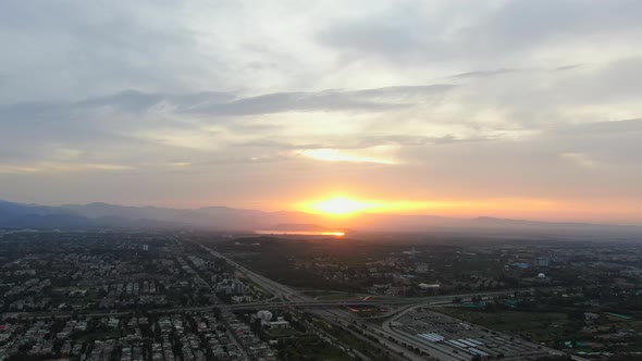 Wide aerial shot of Islamabad at golden hour