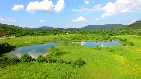 Aerial view of Jesenica river and surrounding in Croatian region Lika.