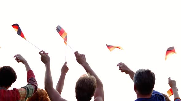 Group of People Waving with German Flags