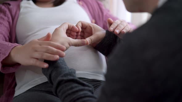 Pregnant Couple Feels Love and Relax at Home