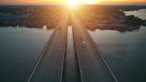 4K Hyper lapse : Drone fly over the bridge and a river.