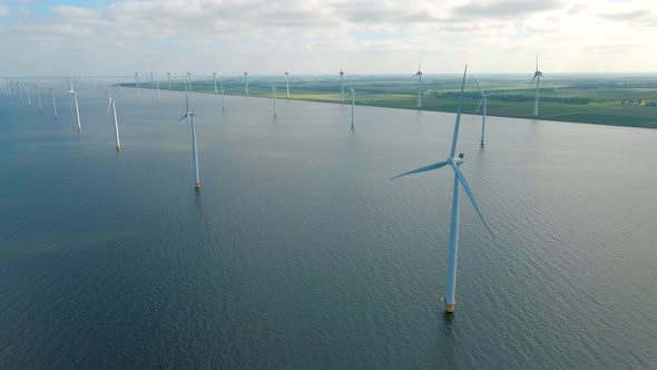 Huge Windmill Turbines Offshore Windmill Farm in the Ocean Westermeerwind Park Windmills Isolated at