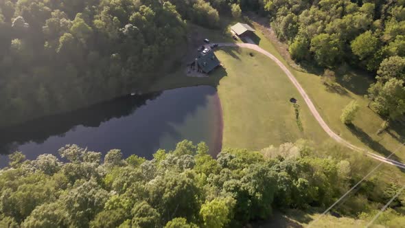 This is a beautiful cabin set right beside a private lake located in Arkansas.