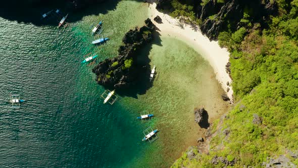 Aerial View of Boats and Limestone Cliffs. El Nido, Philippines