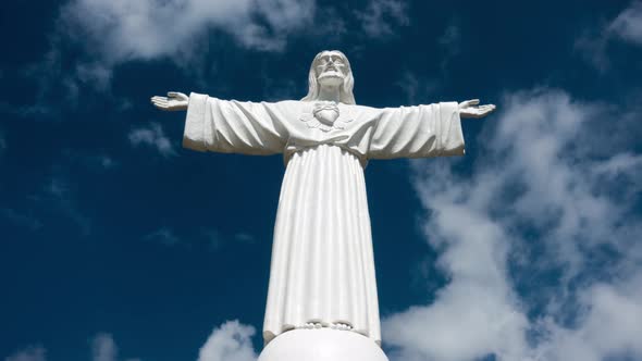 Jesus White Statue and Clouds Timelapse