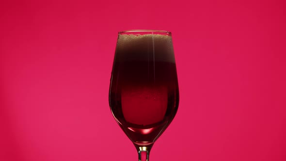 Foamy Cherry Beer in Glass Closeup Belgian Lambic