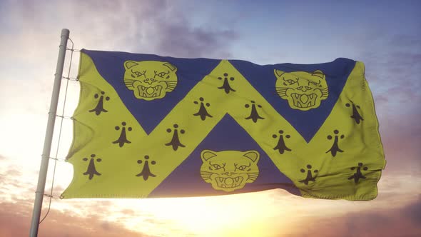 Shropshire Flag England Waving in the Wind Sky and Sun Background