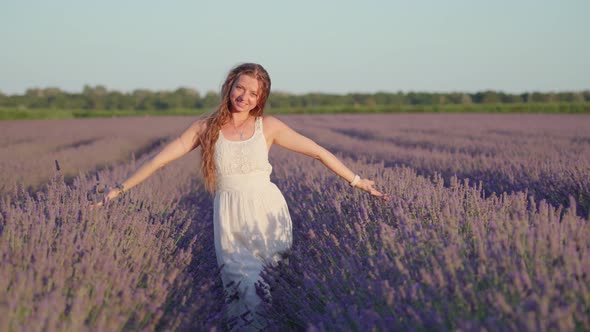 Happy and in Love Girl in the Field with Lavender Plants