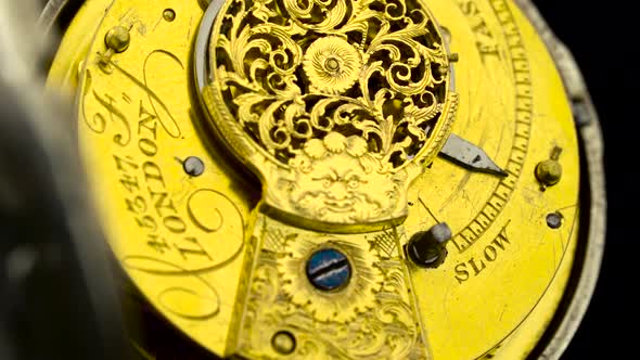 Gears the Mechanism of a Vintage Pocket Watchl. Close Up. Back Background. Sound