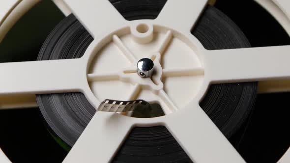 Reel Reels Off Film. Close Up