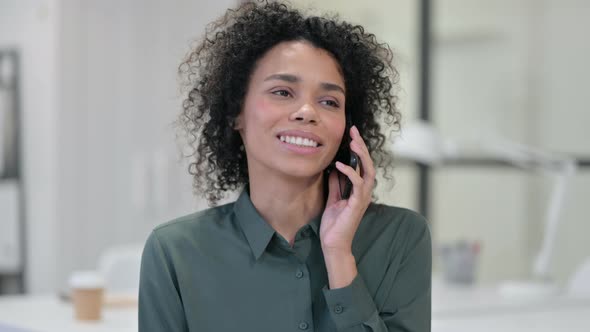 African Woman Talking Phone