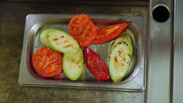 Tomato Zucchini and Pepper Grilled on a Plate in a Restaurant