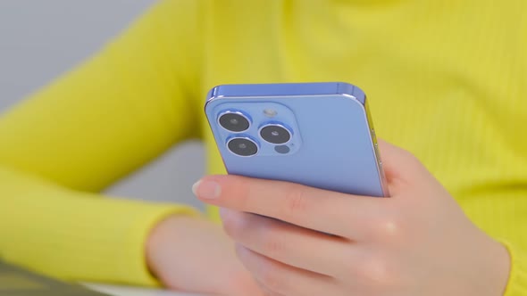Woman using new smartphone in closeup 4k video