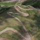 Cars passing through curve in mountainous road. Mountain serpentine road - VideoHive Item for Sale