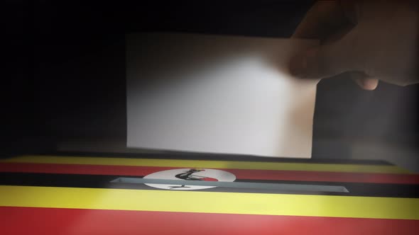 Digital Composite Hand Voting To National Flag OF Uganda