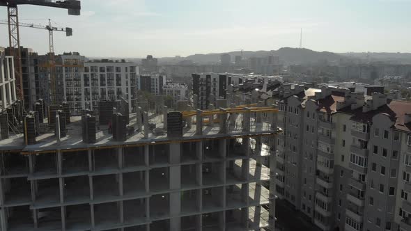 Flight Near the Unfinished Monolithic House