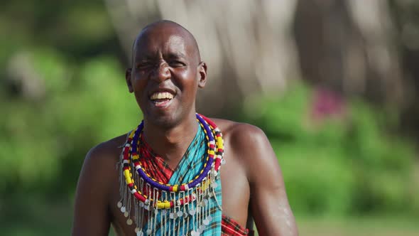 Maasai man laughing