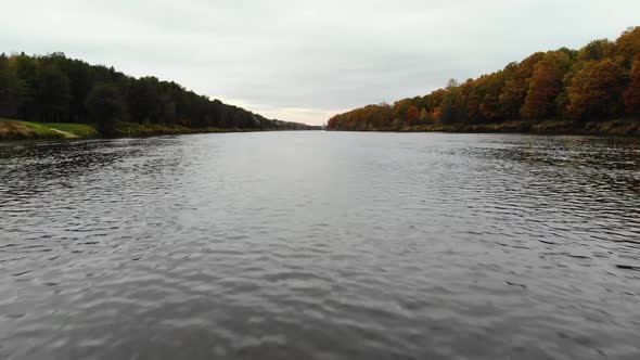 Aerial View. Flying Over the River. Beautiful Autumn Day