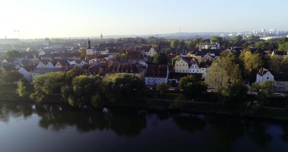 Drone shot of Regensburg and the old town in golden October