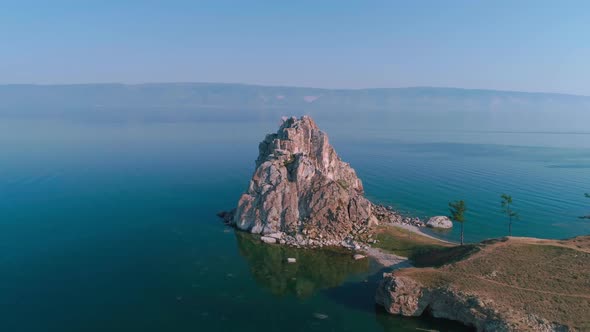 Aerial Drone Footage. Summer. Lake Baikal. Olkhon Island. Rocks in the Siberia. Cape Burkhan