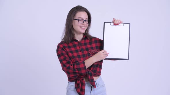 Happy Young Beautiful Hipster Woman Showing Clipboard